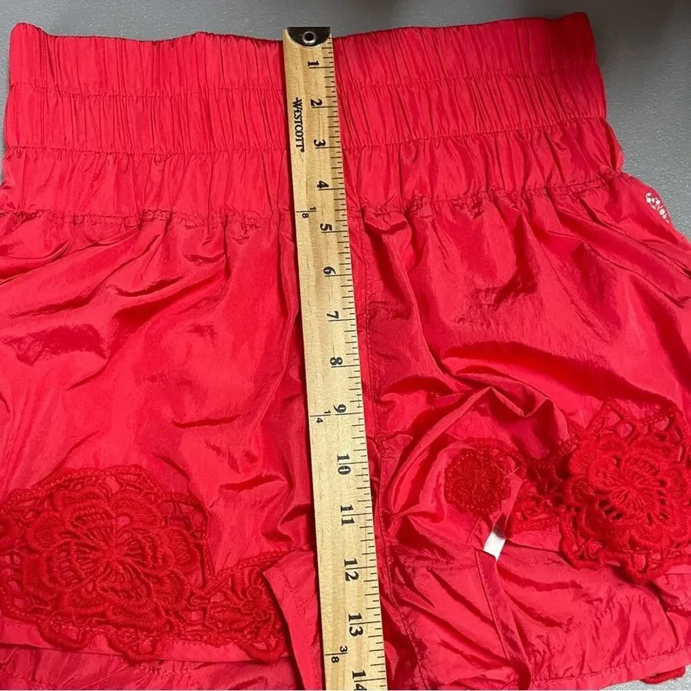 FP Movement Free People neon orange high waisted shorts size Medium